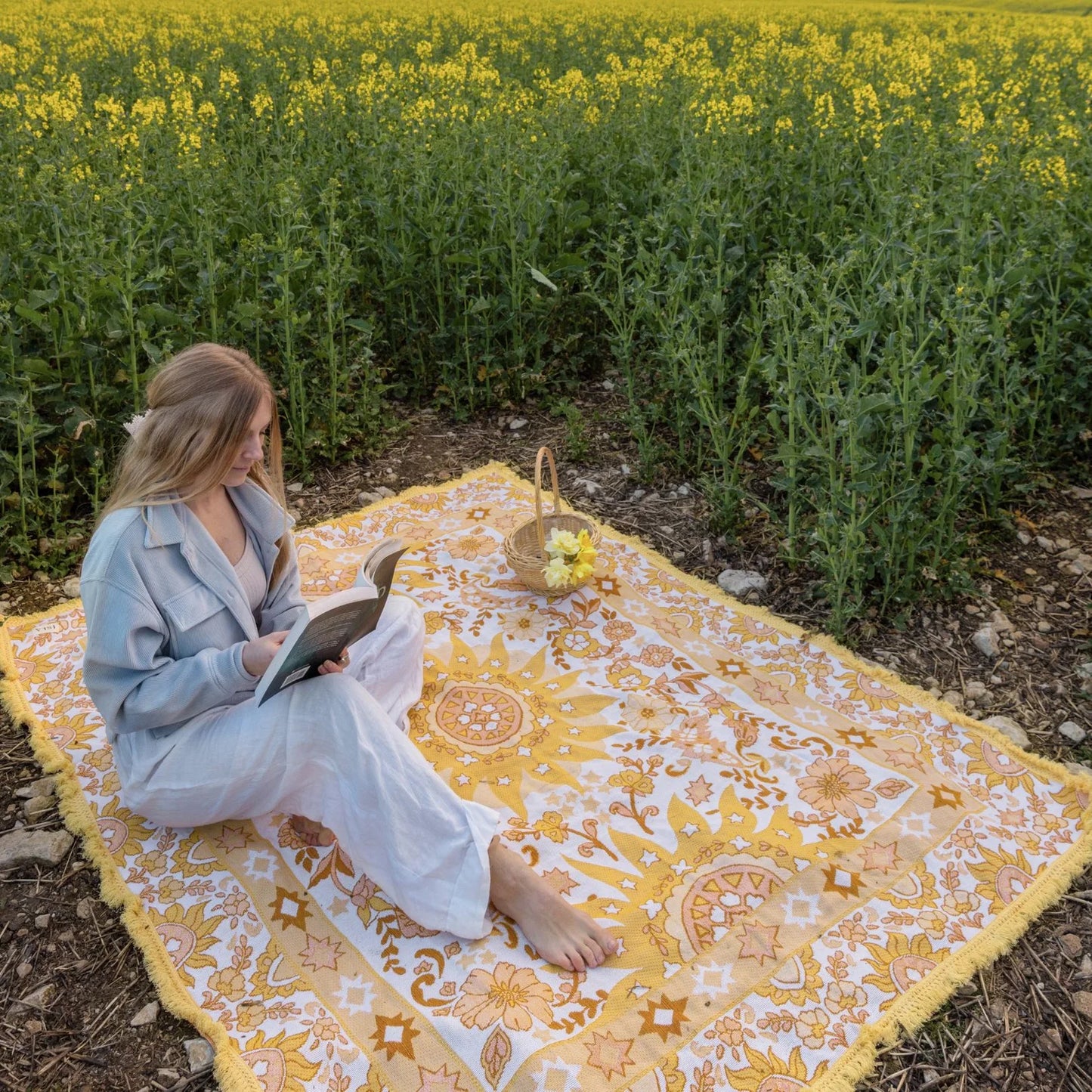 Vacanza Picnic Rug - Isla 

Introducing the Vacanza picnic rug - your passport to an effortless Euro summer escape. Inspired by the vibrant energy of sun-kissed afternoons, this rug features a playful blend of bright summer hues, and a bold bohemian sunshine pattern. Designed to elevate every gathering, it’s the perfect companion for outdoor adventures, from beachside picnics to alfresco dining.

- Made with 100% cotton

- One-colour tassel trim around the rug

- Extra large picnic rug - approx 200 x 160cm 