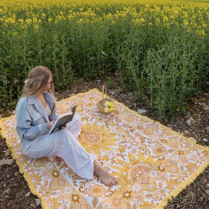 Vacanza Picnic Rug - Isla 

Introducing the Vacanza picnic rug - your passport to an effortless Euro summer escape. Inspired by the vibrant energy of sun-kissed afternoons, this rug features a playful blend of bright summer hues, and a bold bohemian sunshine pattern. Designed to elevate every gathering, it’s the perfect companion for outdoor adventures, from beachside picnics to alfresco dining.

- Made with 100% cotton

- One-colour tassel trim around the rug

- Extra large picnic rug - approx 200 x 160cm 