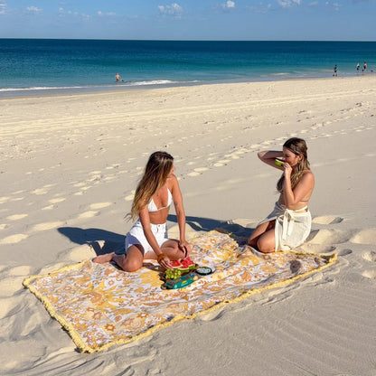 Vacanza Picnic Rug - Isla 

Introducing the Vacanza picnic rug - your passport to an effortless Euro summer escape. Inspired by the vibrant energy of sun-kissed afternoons, this rug features a playful blend of bright summer hues, and a bold bohemian sunshine pattern. Designed to elevate every gathering, it’s the perfect companion for outdoor adventures, from beachside picnics to alfresco dining.

- Made with 100% cotton

- One-colour tassel trim around the rug

- Extra large picnic rug - approx 200 x 160cm 