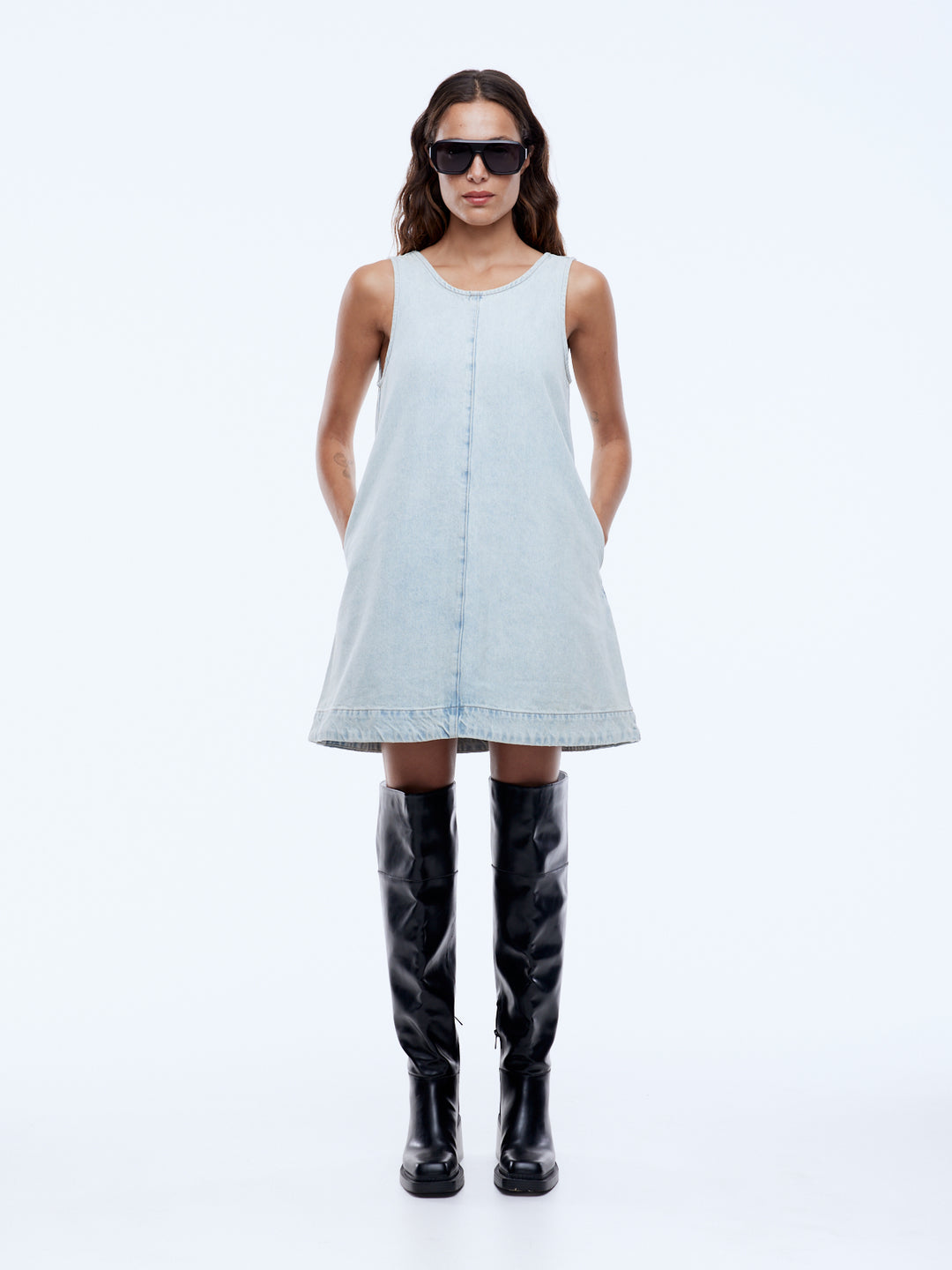 Cool, confident, and effortlessly undone. This is denim, reimagined.

Meet the Ena Pelly Annie Denim Dress, your go-to mini for easy, everyday style with a modern edge. Crafted from pure cotton denim in a fresh light wash, it brings that laid-back, lived-in feel while still looking polished enough to take you anywhere.