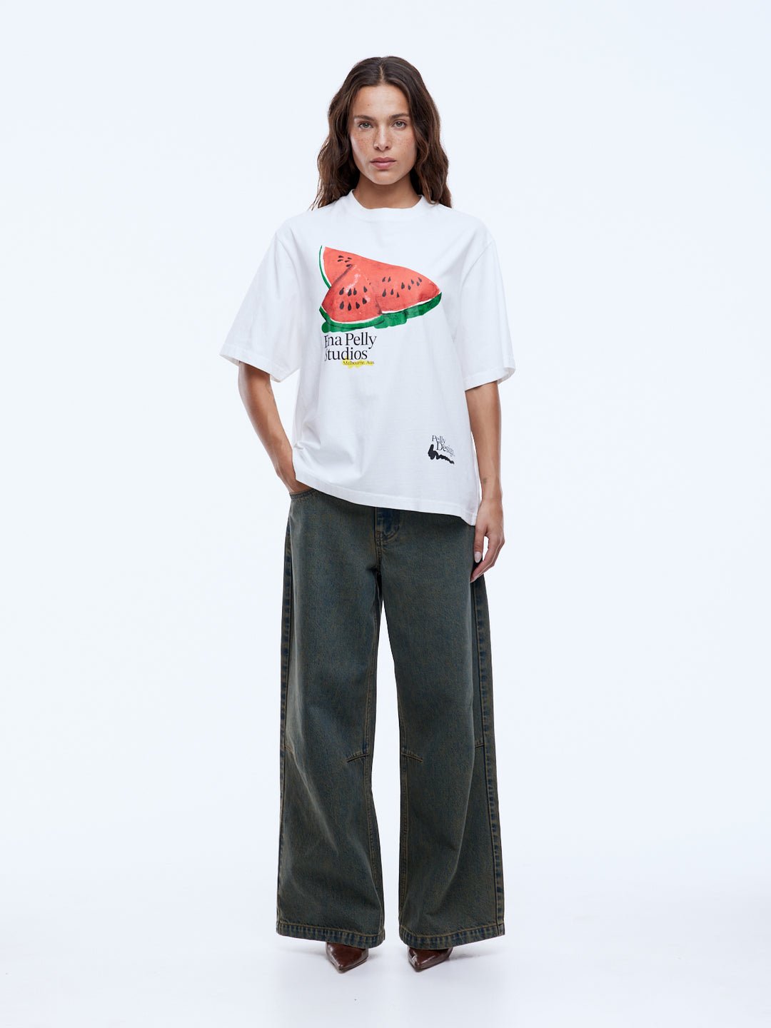 Everyday cool, effortless edge.

Meet the Ena Pelly Watermelon Tee, your new go-to for chilled summer vibes with a playful twist. Made from a soft recycled-cotton blend, this tee combines comfort, style, and a touch of sustainability in one easy-wear package.