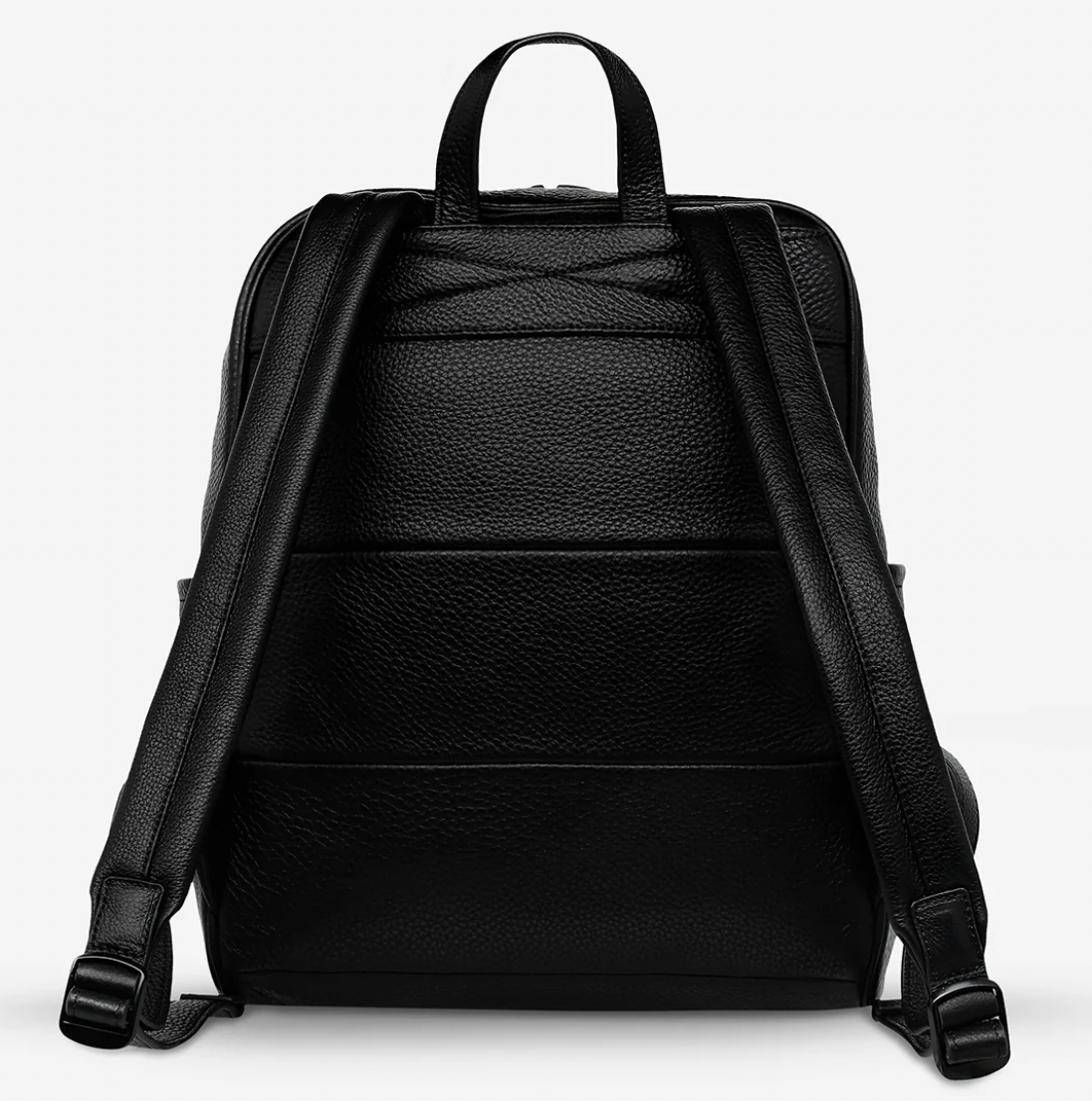 If you call - Black - Status Anxiety 
The archetypal backpack is made to improve your everyday carry. Constructed with comfort and looks in mind and crammed with functionality. The 'If You Call' backpack is perfect for your next last-minute tryst.

Soft shrunken pebble leather
Front zipper pocket, and open side pockets
Internal zipper pocket, and open pouch pockets
Zipper close
Padded shoulder strap
Matte black hardware
Fits a 13 inch MacBook
Custom Status Anxiety lining