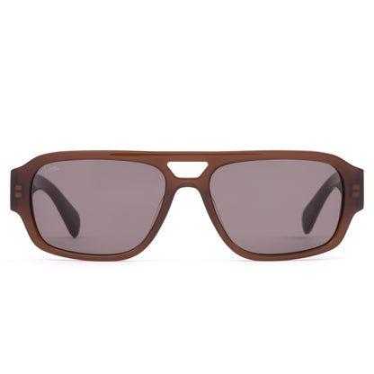 ATLAS : MILKY COCO SITO
Built like it's already won the argument. 

Perfect for: Airport lounges, big meetings, and a presence that precedes you. 

Translucent Brown Acetate Frame
CR39 Grey Lenses
100% UV Protection  
Silver Hardware  
Best suited to round and oval faces. 
 

Frame Shape: Aviator  

Frame Type: Acetate 

Lens Material: CR39 

Lens Type: Polarised 

Lens Treatment: Solid 

Lens Colour: Iron Grey Polar (Cat 3) 