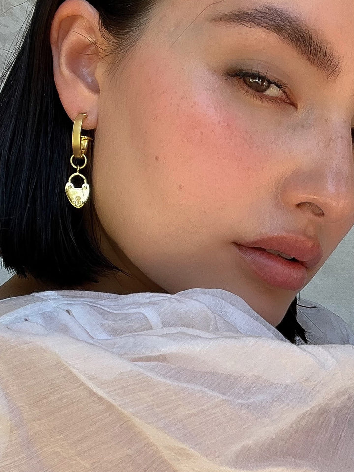 Our&nbsp;bestselling&nbsp;Heart Mini Hoops are a&nbsp;little&nbsp;earring moment that our MM Women absolutely adore!&nbsp; We all love a baby hoop and these goldies are no exception. They easily dress up any outfit, especially with the addition of our gorgeous charms, or they are perfect on their own if you choose to slide the charms off. To be honest, we have been known to wear these for most occasions, including walking the dog and going to pilates. They really are your everyday earring bestie!