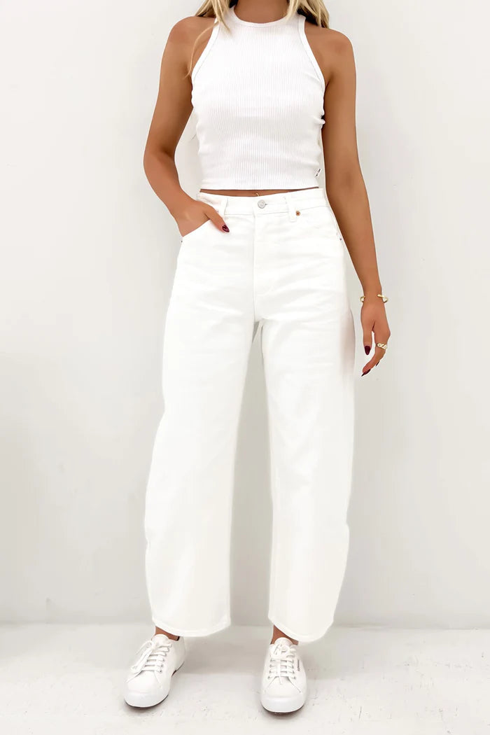 The Gigi Barrel is a super high-rise jeans that hold through the seat, balancing the sculptural leg silhouette.