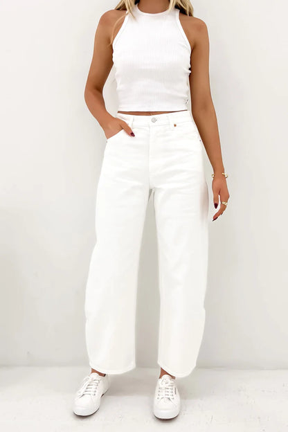 The Gigi Barrel is a super high-rise jeans that hold through the seat, balancing the sculptural leg silhouette.