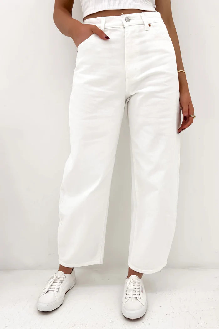 The Gigi Barrel is a super high-rise jeans that hold through the seat, balancing the sculptural leg silhouette.