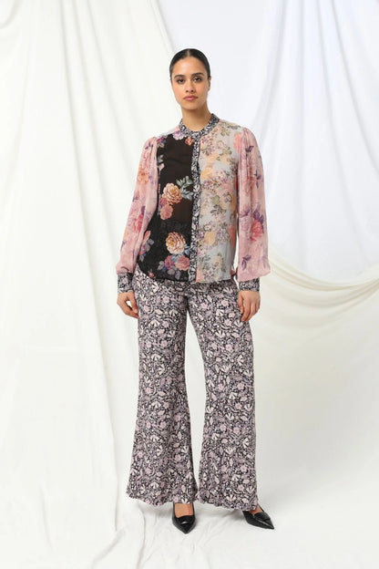 Mackenzie Shirt - Kachel
Meet the Mackenzie Shirt by Kachel - perfectly styled with the Julia Pant for a look that's effortlessly chic.

With its high collar neckline and long puffed sleeves finished with neat cuffs, it's got just the right amount of drama. The delicate floral print adds a lovely feminine touch, making it ideal for everything from workdays to weekend plans. Dress it up or keep it casual - either way, the Mackenzie Shirt brings timeless style with a modern twist.
