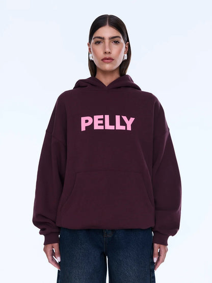 Street Energy. Everyday Ease. 
The Cassie Oversized Hoodie is cut from soft brushed cotton blend fleece in deep cherry red with an oversized silhouette and relaxed dropped shoulders. Finished with bold pop pink Pelly graphics across the chest for a playful statement grounded in everyday comfort.

Cotton rich brushed fleece hoodie
Oversized fit with drop shoulder
Self lined hood
In house graphic design
Rib cuffs and hem band
Model is 176cm and wears size 8