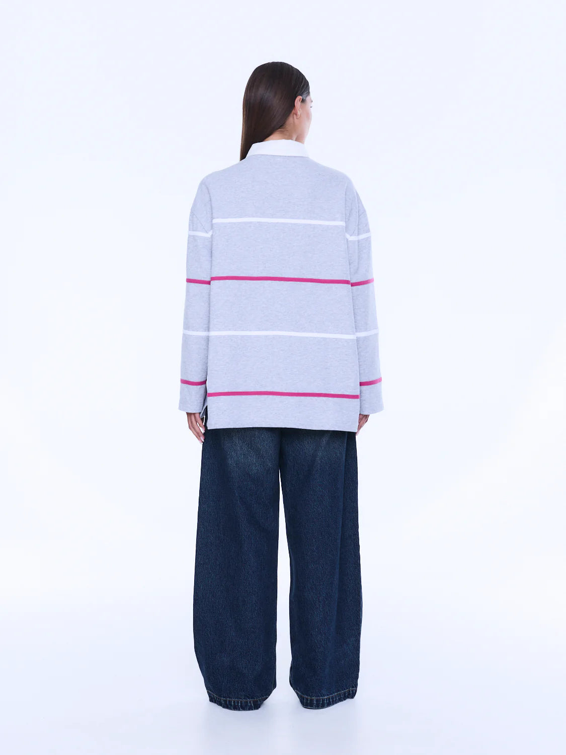 
Relaxed Shape. Subtle Edge.
The Riley Polo is cut from soft cotton jersey in a relaxed long-sleeve silhouette with a concealed placket and contrast collar. Finished with side hem splits, sporty stripe detailing and Ena Pelly chest embroidery that lends a playful retro-inspired feel.
Relaxed fit with long sleeve
Concealed placket
Side hem split
Self fabric stripe in contrast colours
Ena Pelly branding on chest
Model is 176cm and wears size 8