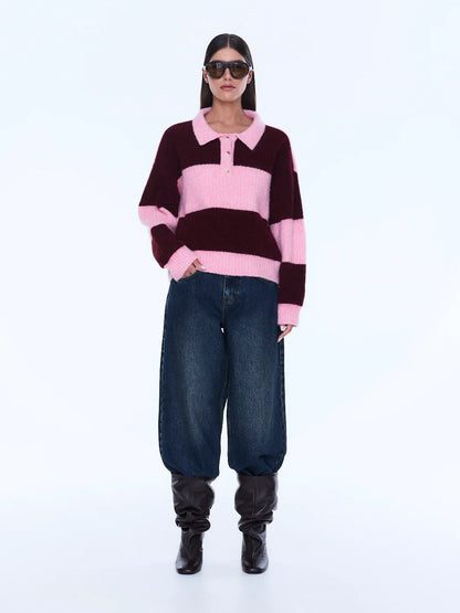 Mikaeka Knit Sweater - Ena Pelly 
Soft Texture. Confident Mood.
The Mikaela Knit Sweater is crafted from a soft alpaca and wool blend with a relaxed silhouette and dropped shoulders for effortless layering. Designed with contrast pink and cherry stripes, a polo-style collar and button placket that balance playful texture with elevated ease.

Relaxed fit
Collar
placket
Drop shoulder
Contrast stripe knit
Dual sizing
Model is 176cm and wears size XXS/XS