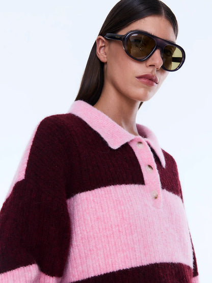 Mikaeka Knit Sweater - Ena Pelly 
Soft Texture. Confident Mood.
The Mikaela Knit Sweater is crafted from a soft alpaca and wool blend with a relaxed silhouette and dropped shoulders for effortless layering. Designed with contrast pink and cherry stripes, a polo-style collar and button placket that balance playful texture with elevated ease.

Relaxed fit
Collar
placket
Drop shoulder
Contrast stripe knit
Dual sizing
Model is 176cm and wears size XXS/XS