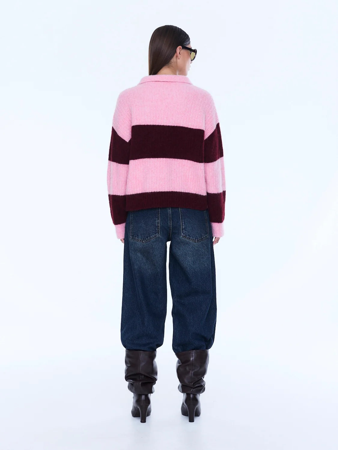 Mikaeka Knit Sweater - Ena Pelly 
Soft Texture. Confident Mood.
The Mikaela Knit Sweater is crafted from a soft alpaca and wool blend with a relaxed silhouette and dropped shoulders for effortless layering. Designed with contrast pink and cherry stripes, a polo-style collar and button placket that balance playful texture with elevated ease.

Relaxed fit
Collar
placket
Drop shoulder
Contrast stripe knit
Dual sizing
Model is 176cm and wears size XXS/XS