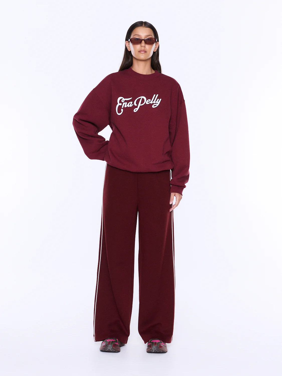 Soft Texture. Confident Mood.
The Mila Oversized Sweater is made from cotton and polyester brushed fleece with an oversized silhouette and dropped shoulders for relaxed everyday comfort. Finished with an exclusive Ena Pelly script graphic in vintage white boucle and contrast black embroidery, delivering elevated texture and bold brand appeal.
Oversized fit sweater
Brushed fleece
Drop shoulder
Rib cuff and neckline
Crew neckline
Exclusively designed in house print
Model is 173cm and wears size 8