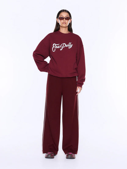Soft Texture. Confident Mood.
The Mila Oversized Sweater is made from cotton and polyester brushed fleece with an oversized silhouette and dropped shoulders for relaxed everyday comfort. Finished with an exclusive Ena Pelly script graphic in vintage white boucle and contrast black embroidery, delivering elevated texture and bold brand appeal.
Oversized fit sweater
Brushed fleece
Drop shoulder
Rib cuff and neckline
Crew neckline
Exclusively designed in house print
Model is 173cm and wears size 8