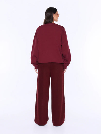 Soft Texture. Confident Mood.
The Mila Oversized Sweater is made from cotton and polyester brushed fleece with an oversized silhouette and dropped shoulders for relaxed everyday comfort. Finished with an exclusive Ena Pelly script graphic in vintage white boucle and contrast black embroidery, delivering elevated texture and bold brand appeal.
Oversized fit sweater
Brushed fleece
Drop shoulder
Rib cuff and neckline
Crew neckline
Exclusively designed in house print
Model is 173cm and wears size 8
