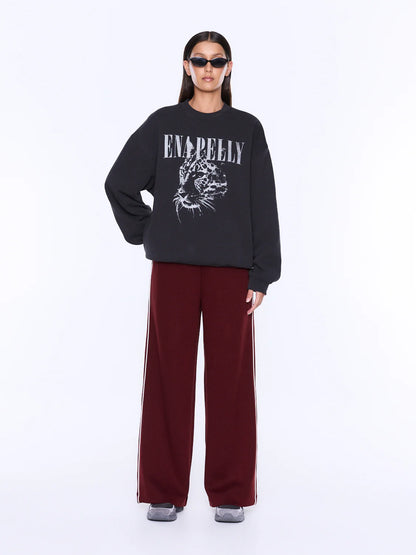 Mila Oversized Sweater Cheetah - Ena Pelly

Graphic Attitude. Relaxed Fit. The Mila Oversized Sweater is cut from cotton and polyester brushed fleece with an oversized silhouette that embodies relaxed comfort. Finished with an exclusive animal-inspired graphic in a semi-plastisol print, while dropped shoulders and ribbed trims enhance its effortless street-inspired mood.

Oversized fit sweater
Purchase your usual size
Brushed fleece
Drop shoulder 
Rib cuff and neckline
Crew neckline
