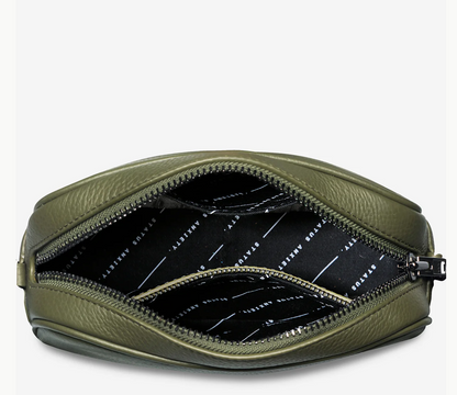 Plunder Bag With Dual Straps - Khaki - Status Anxiety 

Our best selling bag of all time now comes with two different straps for twice the versatility. Clip on the leather strap for dressier occasions, or the webbed strap for a more casual vibe. It's a no brainer.

Soft shrunken pebble leather
Comes with Leather Strap Thin & Web Strap Medium
Back slider pocket
Internal zipper pocket, and open pouch pockets
Zipper close
Custom Status Anxiety lining
Comes in a Status Anxiety branded drawstring bag