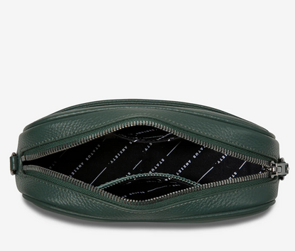 Plunder Bag With Dual Straps - Green - Status Anxiety 

Our best selling bag of all time now comes with two different straps for twice the versatility. Clip on the leather strap for dressier occasions, or the webbed strap for a more casual vibe. It's a no brainer.

Soft shrunken pebble leather
Comes with Leather Strap Thin & Web Strap Medium
Back slider pocket
Internal zipper pocket, and open pouch pockets
Zipper close
Custom Status Anxiety lining
Comes in a Status Anxiety branded drawstring bag