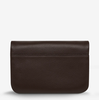 Impermanent Wallet - Cocoa - Status Anxiety 
Nothing lasts forever they say, but we can assure you that the Impermanent wallet is likely to last a bloody long time. Stash your stuff in its relaxed less structured form and slip it into your pocket or handbag.

Soft shrunken pebble leather
Custom Status Anxiety lining
6 card slots (option to double up)
Internal zipper pocket
Magnet close
Gunmetal hardware
Silver foil logo
Comes in a Status Anxiety branded drawstring bag