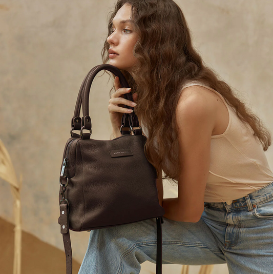 Last Mountains Bag - Cocoa - Status Anxiety 

The final assault to end it, to prevail over the proclivity to someone or something. The Last Mountains handbag with its taller silhouette is the perfect day to night companion and can be worn over elbow, shoulder or body (with long strap). Features a wide-opening main compartment, longer shoulder straps for added comfort and secret magnet-close pocket on the outside for your phone etc.

Soft shrunken pebble leather
Back magnet pocket
Internal zipper pocket