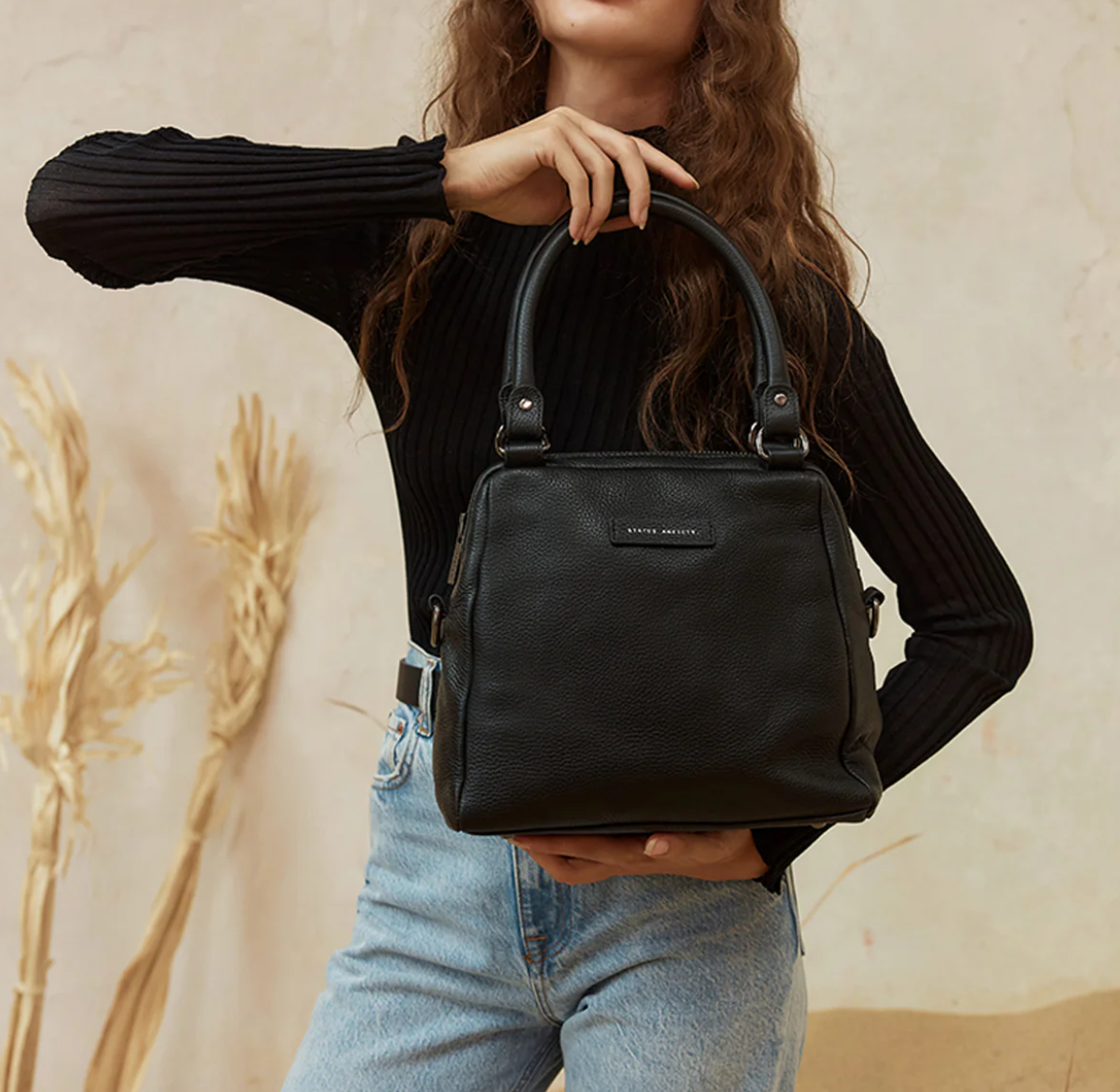 Last Mountains Bag - Black - Status Anxiety 

The final assault to end it, to prevail over the proclivity to someone or something. The Last Mountains handbag with its taller silhouette is the perfect day to night companion and can be worn over elbow, shoulder or body (with long strap). Features a wide-opening main compartment, longer shoulder straps for added comfort and secret magnet-close pocket on the outside for your phone etc.

Soft shrunken pebble leather
Back magnet pocket
Internal zipper pocket