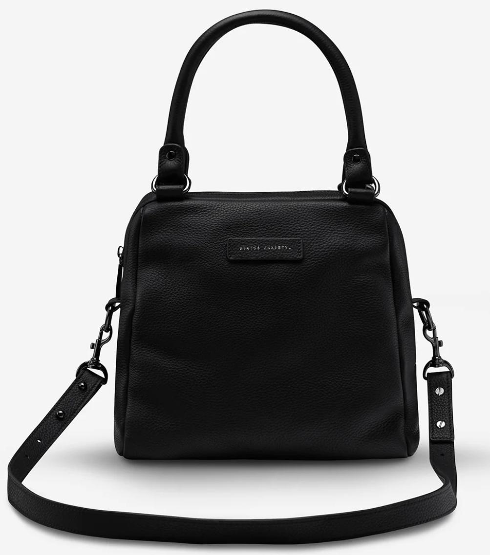 Last Mountains Bag - Black - Status Anxiety 

The final assault to end it, to prevail over the proclivity to someone or something. The Last Mountains handbag with its taller silhouette is the perfect day to night companion and can be worn over elbow, shoulder or body (with long strap). Features a wide-opening main compartment, longer shoulder straps for added comfort and secret magnet-close pocket on the outside for your phone etc.

Soft shrunken pebble leather
Back magnet pocket
Internal zipper pocket