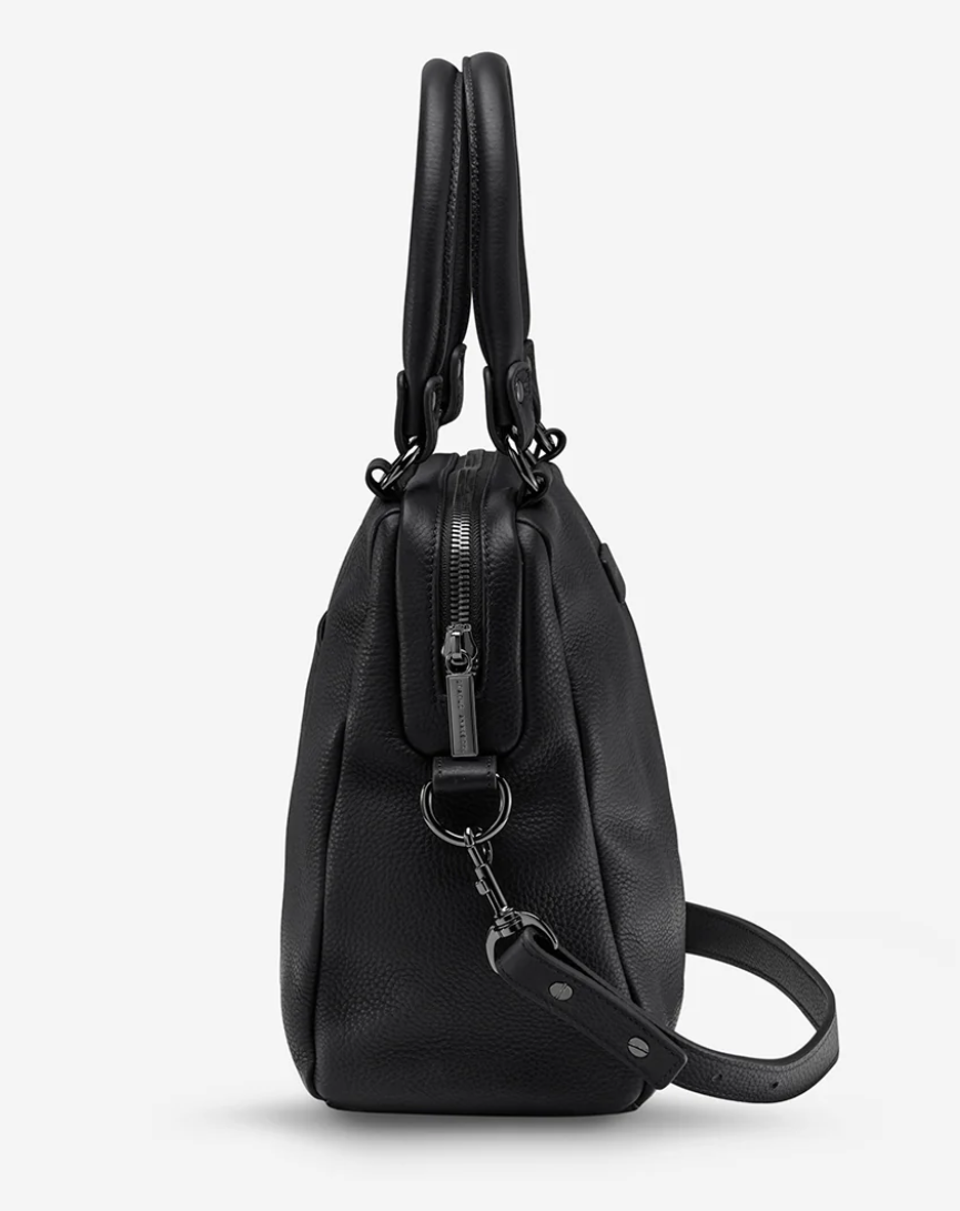 Last Mountains Bag - Black - Status Anxiety 

The final assault to end it, to prevail over the proclivity to someone or something. The Last Mountains handbag with its taller silhouette is the perfect day to night companion and can be worn over elbow, shoulder or body (with long strap). Features a wide-opening main compartment, longer shoulder straps for added comfort and secret magnet-close pocket on the outside for your phone etc.

Soft shrunken pebble leather
Back magnet pocket
Internal zipper pocket