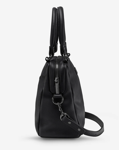 Last Mountains Bag - Black - Status Anxiety 

The final assault to end it, to prevail over the proclivity to someone or something. The Last Mountains handbag with its taller silhouette is the perfect day to night companion and can be worn over elbow, shoulder or body (with long strap). Features a wide-opening main compartment, longer shoulder straps for added comfort and secret magnet-close pocket on the outside for your phone etc.

Soft shrunken pebble leather
Back magnet pocket
Internal zipper pocket