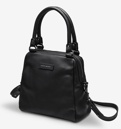 Last Mountains Bag - Black - Status Anxiety 

The final assault to end it, to prevail over the proclivity to someone or something. The Last Mountains handbag with its taller silhouette is the perfect day to night companion and can be worn over elbow, shoulder or body (with long strap). Features a wide-opening main compartment, longer shoulder straps for added comfort and secret magnet-close pocket on the outside for your phone etc.

Soft shrunken pebble leather
Back magnet pocket
Internal zipper pocket
