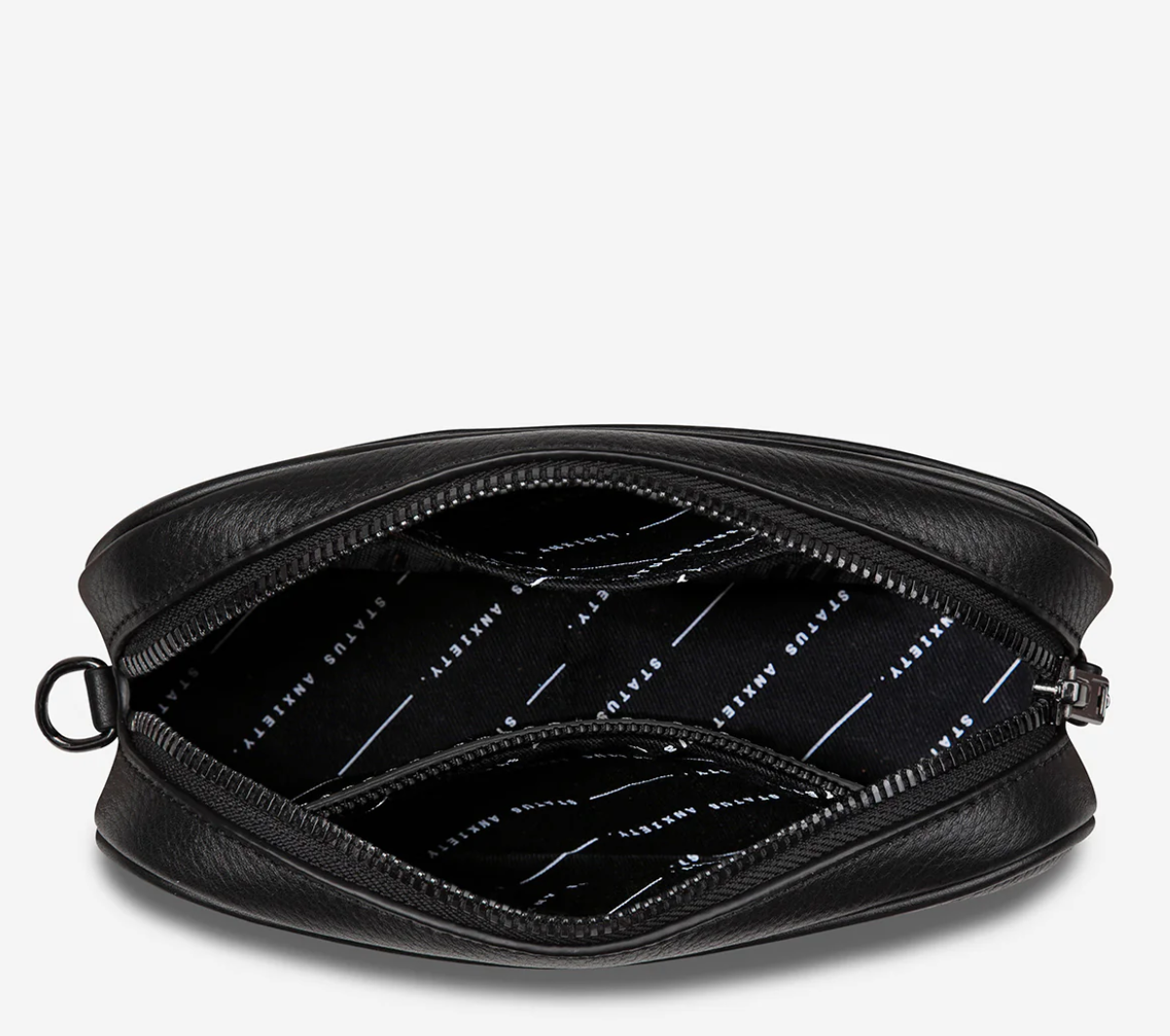 Plunder Bag Black With Duals Straps - Black - Status Anxiety 

Our best selling bag of all time now comes with two different straps for twice the versatility. Clip on the leather strap for dressier occasions, or the webbed strap for a more casual vibe. It's a no brainer.

Soft shrunken pebble leather
Comes with Leather Strap Thin & Web Strap Medium
Back slider pocket
Internal zipper pocket, and open pouch pockets
Zipper close
Custom Status Anxiety lining
Comes in a Status Anxiety branded drawstring bag