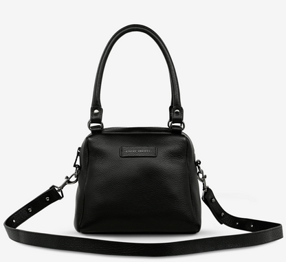 Mini Mountains Bag - Black - Status Anxiety 

Good things come in small packages. 'Mini Mountains' is a more compact version of the iconic 'Last Mountains' bag. This day to night companion can be worn on elbow, shoulder, or cross body (with included long strap). Features a wide-opening main compartment, longer shoulder strap for added comfort, and secret magnet-close pocket on the outside for your phone etc.

Soft shrunken pebble leather
Back magnet pocket
Internal zipper pocket, and open pockets