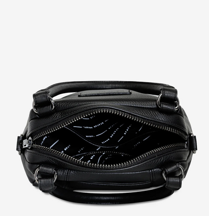 Mini Mountains Bag - Black - Status Anxiety 

Good things come in small packages. 'Mini Mountains' is a more compact version of the iconic 'Last Mountains' bag. This day to night companion can be worn on elbow, shoulder, or cross body (with included long strap). Features a wide-opening main compartment, longer shoulder strap for added comfort, and secret magnet-close pocket on the outside for your phone etc.

Soft shrunken pebble leather
Back magnet pocket
Internal zipper pocket, and open pockets
