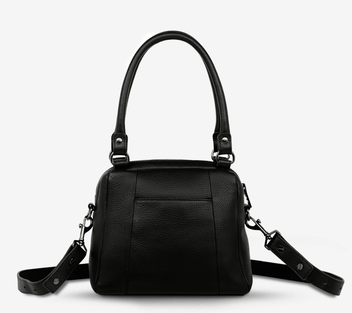 Mini Mountains Bag - Black - Status Anxiety 

Good things come in small packages. 'Mini Mountains' is a more compact version of the iconic 'Last Mountains' bag. This day to night companion can be worn on elbow, shoulder, or cross body (with included long strap). Features a wide-opening main compartment, longer shoulder strap for added comfort, and secret magnet-close pocket on the outside for your phone etc.

Soft shrunken pebble leather
Back magnet pocket
Internal zipper pocket, and open pockets