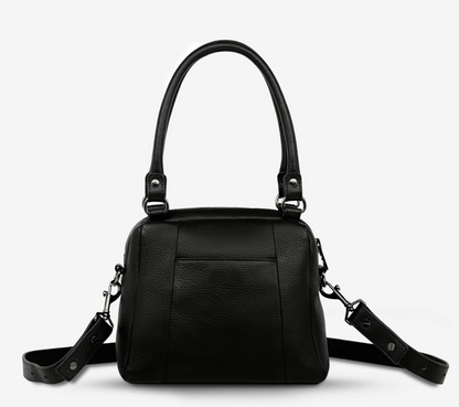 Mini Mountains Bag - Black - Status Anxiety 

Good things come in small packages. 'Mini Mountains' is a more compact version of the iconic 'Last Mountains' bag. This day to night companion can be worn on elbow, shoulder, or cross body (with included long strap). Features a wide-opening main compartment, longer shoulder strap for added comfort, and secret magnet-close pocket on the outside for your phone etc.

Soft shrunken pebble leather
Back magnet pocket
Internal zipper pocket, and open pockets