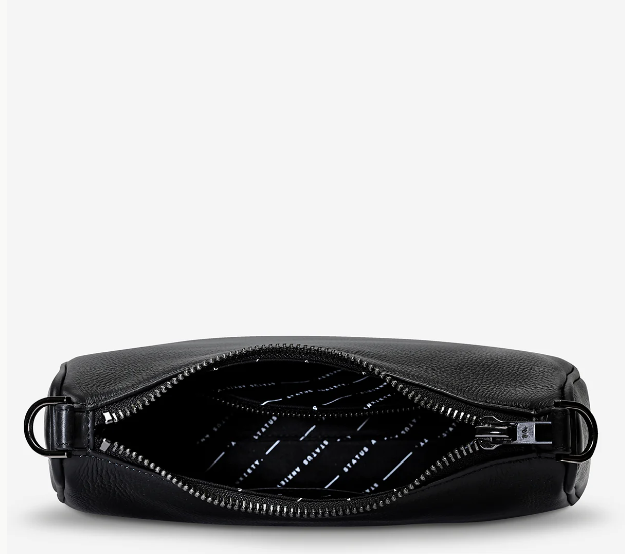 Look Both Ways Bag - Black - Status Anxiety 
The 'Look Both Ways' bag will keep people guessing with her dual personality straps. Use the shorter shoulder strap for a dressier on-the-go look or go the longer webbed strap option to give off a more casual 'I don't have plans today' vibe.

Soft shrunken pebble leather
Comes with leather shoulder strap and long webbed strap
Internal zipper pocket one side and 3 card slots on the other
Black custom Status Anxiety lining
20cm x 14cm x 7cm
Leather strap length 26c