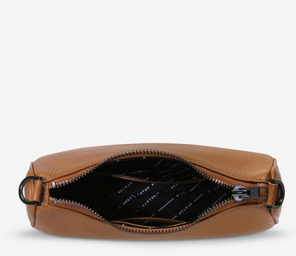 The 'Look Both Ways' bag will keep people guessing with her dual personality straps. Use the shorter shoulder strap for a dressier on-the-go look or go the longer web strap option to give off a more casual 'I don't have plans today' vibe.

Soft shrunken pebble leather
Internal zipper pocket, and card slots
Dual straps (short leather strap & thin webbed strap)
Custom Status Anxiety lining
Comes in a Status Anxiety branded drawstring bag