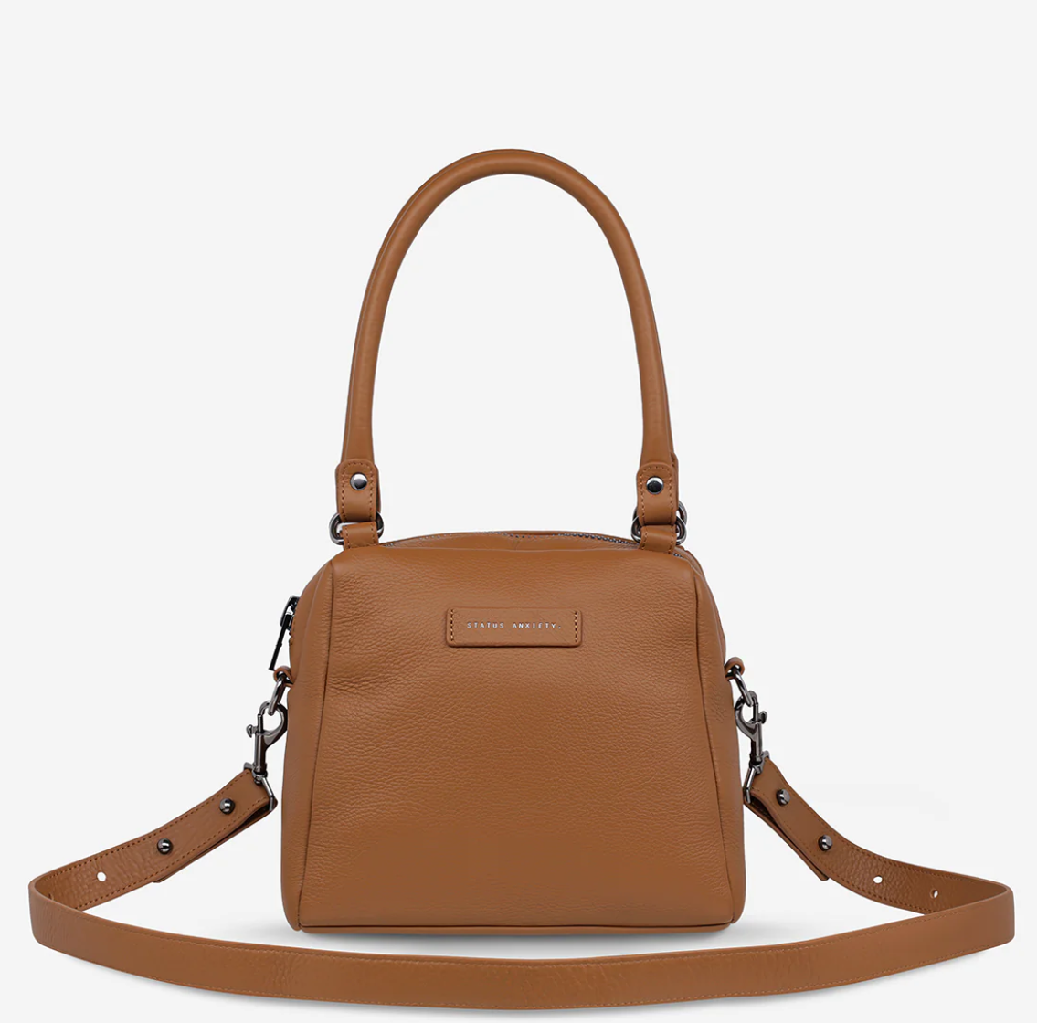 Mini Mountains Bag - Camel - Status Anxiety 

Good things come in small packages. 'Mini Mountains' is a more compact version of the iconic 'Last Mountains' bag. This day to night companion can be worn on elbow, shoulder, or cross body (with included long strap). Features a wide-opening main compartment, longer shoulder strap for added comfort, and secret magnet-close pocket on the outside for your phone etc.

Soft shrunken pebble leather
Back magnet pocket
Internal zipper pocket, and open pockets