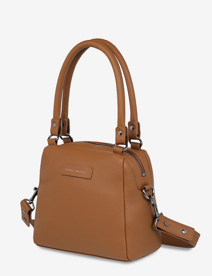 Mini Mountains Bag - Camel - Status Anxiety 

Good things come in small packages. 'Mini Mountains' is a more compact version of the iconic 'Last Mountains' bag. This day to night companion can be worn on elbow, shoulder, or cross body (with included long strap). Features a wide-opening main compartment, longer shoulder strap for added comfort, and secret magnet-close pocket on the outside for your phone etc.

Soft shrunken pebble leather
Back magnet pocket
Internal zipper pocket, and open pockets