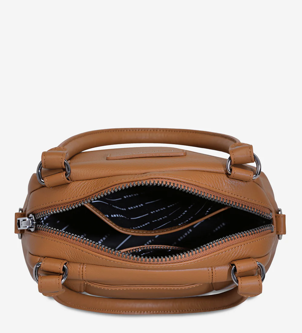 Mini Mountains Bag - Camel - Status Anxiety 

Good things come in small packages. 'Mini Mountains' is a more compact version of the iconic 'Last Mountains' bag. This day to night companion can be worn on elbow, shoulder, or cross body (with included long strap). Features a wide-opening main compartment, longer shoulder strap for added comfort, and secret magnet-close pocket on the outside for your phone etc.

Soft shrunken pebble leather
Back magnet pocket
Internal zipper pocket, and open pockets