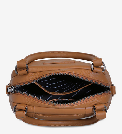 Mini Mountains Bag - Camel - Status Anxiety 

Good things come in small packages. 'Mini Mountains' is a more compact version of the iconic 'Last Mountains' bag. This day to night companion can be worn on elbow, shoulder, or cross body (with included long strap). Features a wide-opening main compartment, longer shoulder strap for added comfort, and secret magnet-close pocket on the outside for your phone etc.

Soft shrunken pebble leather
Back magnet pocket
Internal zipper pocket, and open pockets