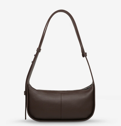 Haven Bag - Cocoa - Status Anxiety 

Versatile, elevated, and effortless. Wear 'Haven' over the shoulder or crossbody with her adjustable strap – whatever the day calls for.

Soft shrunken pebble leather
Internal zipper pocket, and two open pouch pockets
Zipper close
Custom Status Anxiety lining
Comes in a Status Anxiety branded drawstring bag