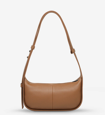 Haven Bag - Camel - Status Anxiety 

Versatile, elevated, and effortless. Wear 'Haven' over the shoulder or crossbody with her adjustable strap – whatever the day calls for.

Soft shrunken pebble leather
Internal zipper pocket, and two open pouch pockets
Zipper close
Custom Status Anxiety lining
Comes in a Status Anxiety branded drawstring bag