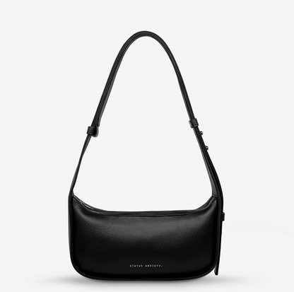 Haven Bag - Black - Status Anxiety 

Versatile, elevated, and effortless. Wear 'Haven' over the shoulder or crossbody with her adjustable strap – whatever the day calls for.

Soft shrunken pebble leather
Internal zipper pocket, and two open pouch pockets
Zipper close
Custom Status Anxiety lining
Comes in a Status Anxiety branded drawstring bag