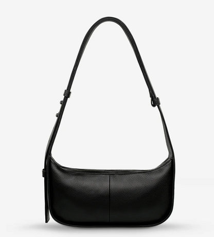 Haven Bag - Black - Status Anxiety 

Versatile, elevated, and effortless. Wear 'Haven' over the shoulder or crossbody with her adjustable strap – whatever the day calls for.

Soft shrunken pebble leather
Internal zipper pocket, and two open pouch pockets
Zipper close
Custom Status Anxiety lining
Comes in a Status Anxiety branded drawstring bag