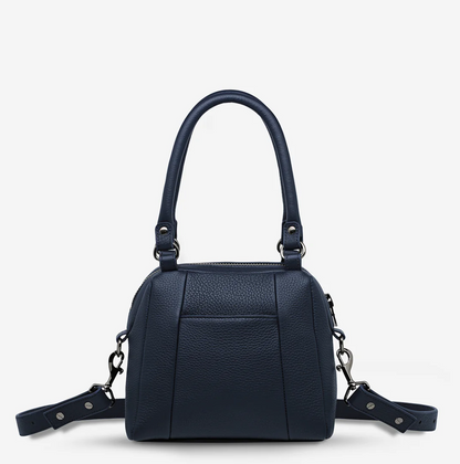 Mini Mountains Bag - Midnight Blue - Status Anxiety 

Good things come in small packages. 'Mini Mountains' is a more compact version of the iconic 'Last Mountains' bag. This day to night companion can be worn on elbow, shoulder, or cross body (with included long strap). Features a wide-opening main compartment, longer shoulder strap for added comfort, and secret magnet-close pocket on the outside for your phone etc.

Soft shrunken pebble leather
Back magnet pocket
Internal zipper pocket, and open pockets