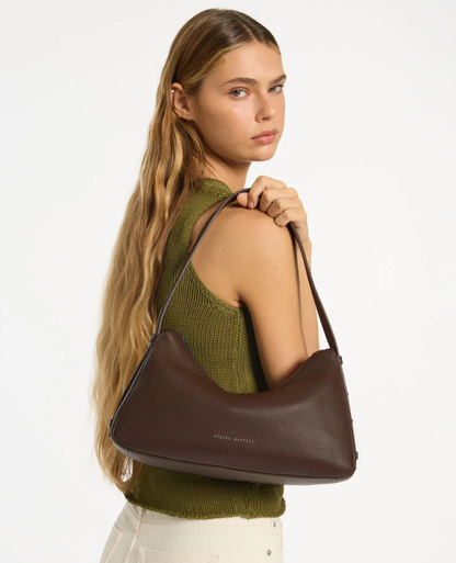 Hideout Bag - Cocoa - Status Anxiety 

Understated in design and quietly capable in size, 'Hideout' keeps things simple with its soft, slouchy shape and attitude.

Soft shrunken pebble leather
Internal zipper pocket, lipstick pocket, and open pouch pocket
Zipper closure
Custom Status Anxiety lining
Comes in a Status Anxiety branded drawstring bag