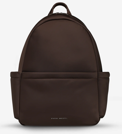 Frankie Recycled Bag - Truffle - Status Anxiety 

Tough, functional and lightweight – just what you've been looking for in a backpack (plus not to mention obvious good looks). Multiple exterior pockets keep everything within reach, while its lightweight build makes it ready for workdays, weekends, and everything between.

Premium reinforced recycled polyester (otherwise destined for landfill)
Back sleeve for sliding onto your suitcase
Dual external side pockets, and front zipper pocket
Internal open pockets