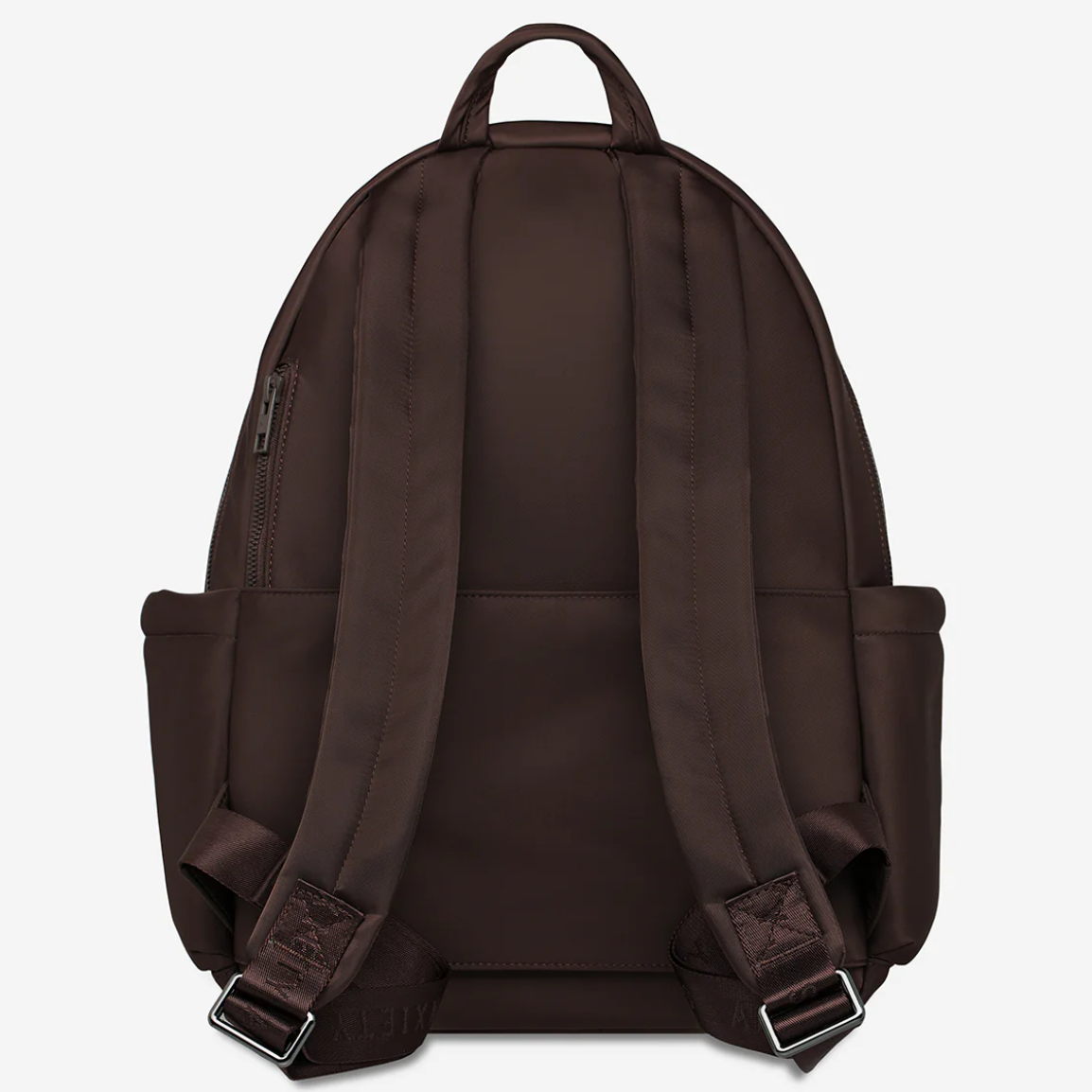 Frankie Recycled Bag - Truffle - Status Anxiety 

Tough, functional and lightweight – just what you've been looking for in a backpack (plus not to mention obvious good looks). Multiple exterior pockets keep everything within reach, while its lightweight build makes it ready for workdays, weekends, and everything between.

Premium reinforced recycled polyester (otherwise destined for landfill)
Back sleeve for sliding onto your suitcase
Dual external side pockets, and front zipper pocket
Internal open pockets