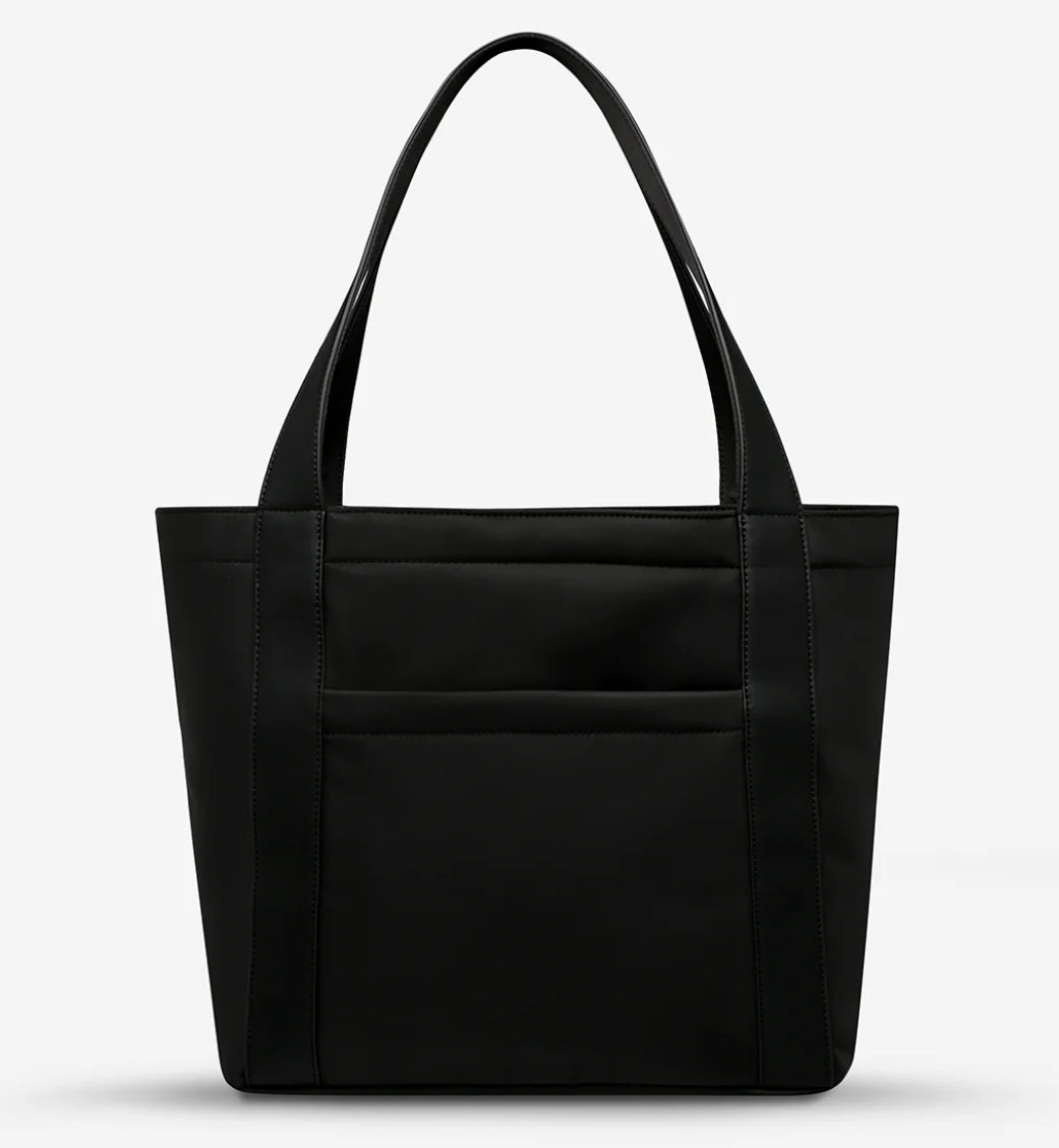 Mikah Recycled Bag - Black - Status Anxiety 

Frankie Recycled Bag - Truffle - Status Anxiety 

Tough, functional and lightweight – just what you've been looking for in a backpack (plus not to mention obvious good looks). Multiple exterior pockets keep everything within reach, while its lightweight build makes it ready for workdays, weekends, and everything between.

Premium reinforced recycled polyester (otherwise destined for landfill)
Back sleeve for sliding onto your suitcase
Dual external side pockets,